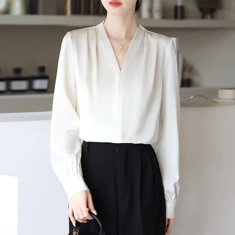 Women's blue long sleeve shirt with slim fit design and 3D stitching construction detail