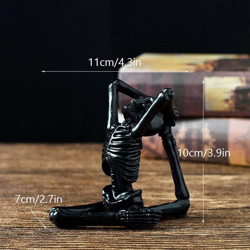 Spooky skeleton desktop decorations featuring intricate resin skulls and skeletons in vintage white and ominous black color options