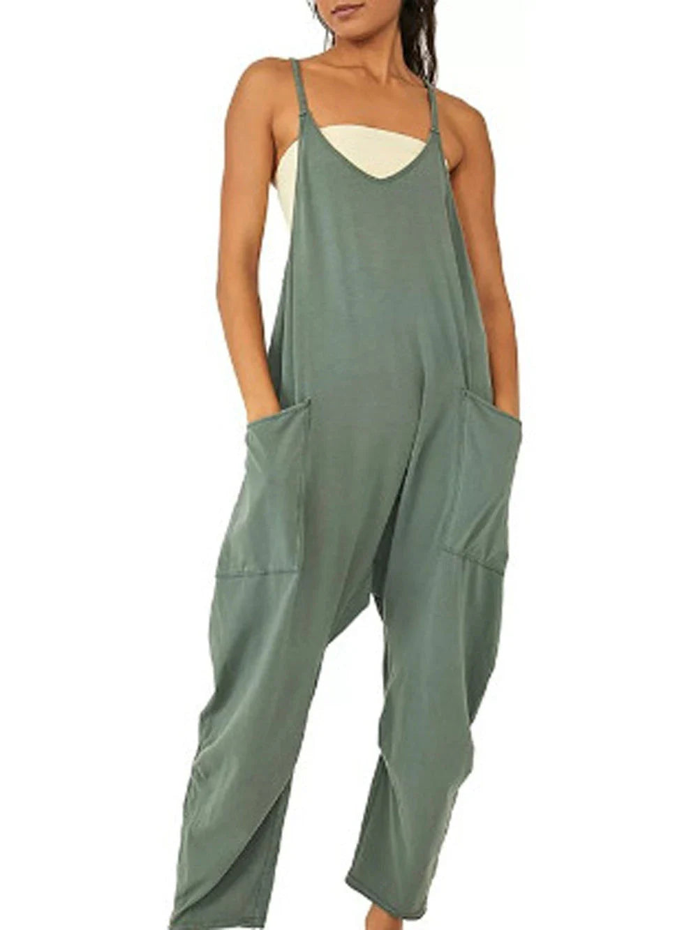 Sleeveless jumpsuit with spaghetti straps, pockets, and zipper closure in various colors
