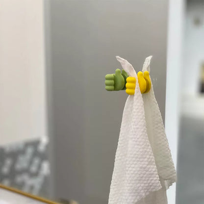 Silicone thumb wall hooks in various colors for organizing kitchen and bathroom items