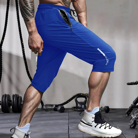Men's cropped sports pants in quick-drying nylon with straight fit and elastic waistband