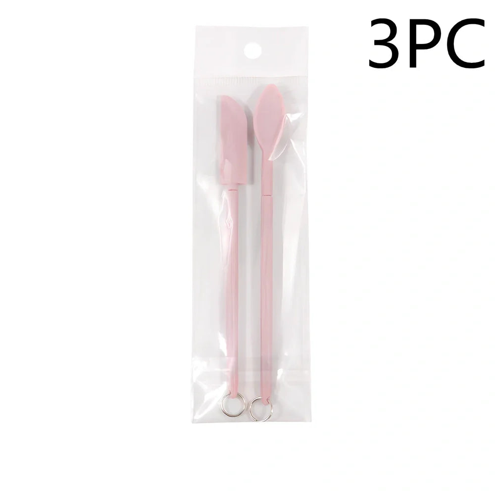 Retractable silicone cosmetic spatula extended to 15cm with scraper tool for product application