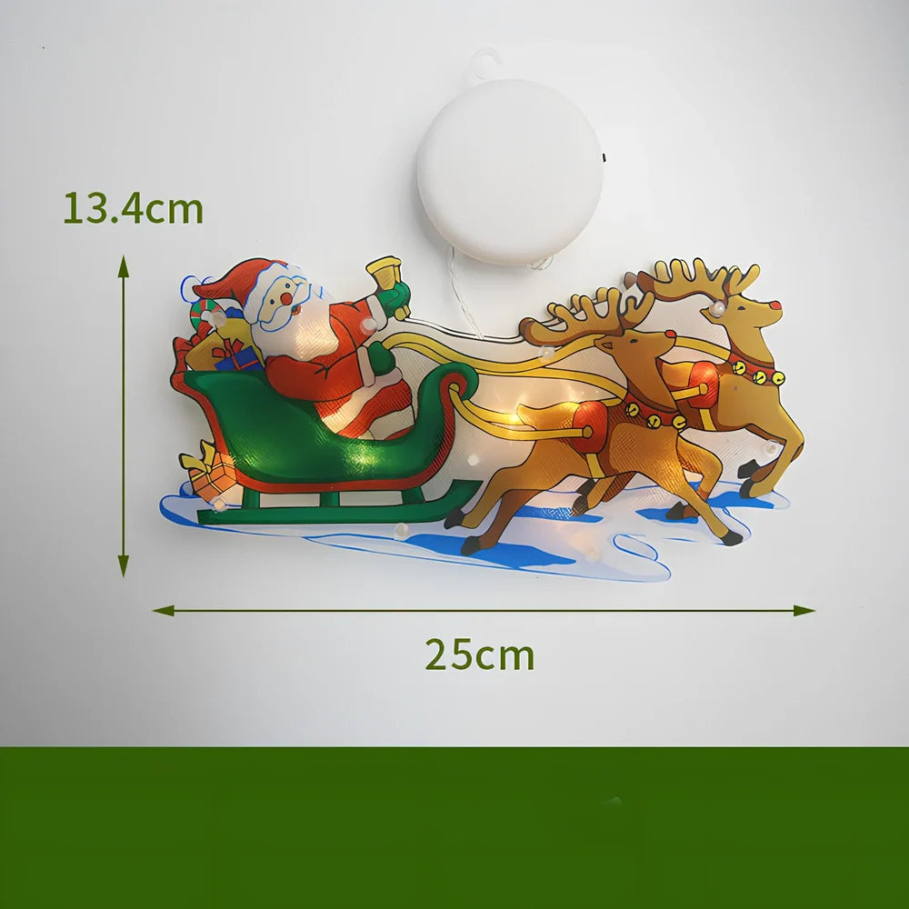 LED Christmas hanging lights with suction cups showing snowman design illuminated on window