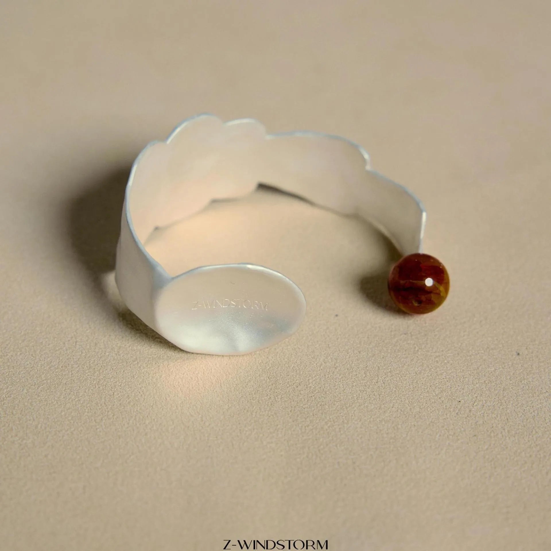 Electroplated alloy ring and bracelet with spoon and pork motifs and diamond shapes