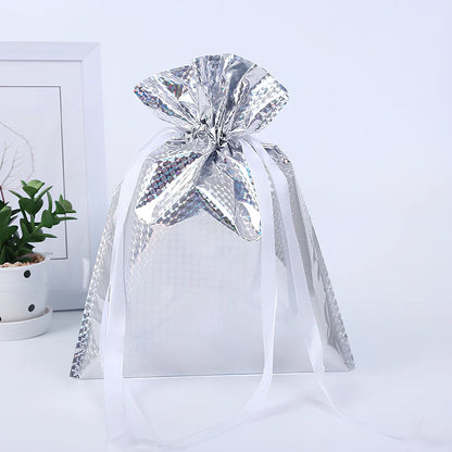 Christmas gift bag with drawstring closure in laser gold finish, 32x24cm dimensions