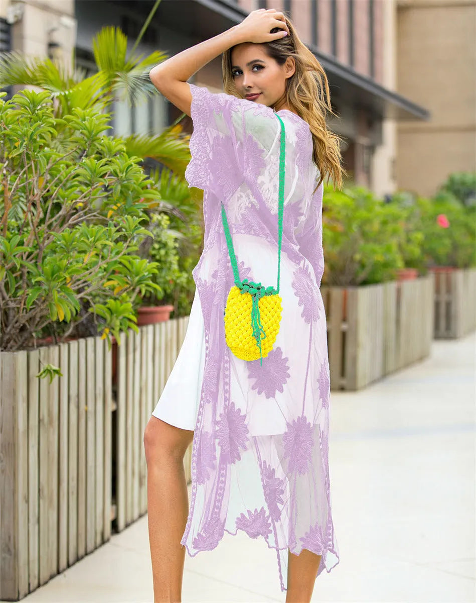 Light purple lace-embroidered beach dress cardigan laid flat, a free-size swimwear cover-up.