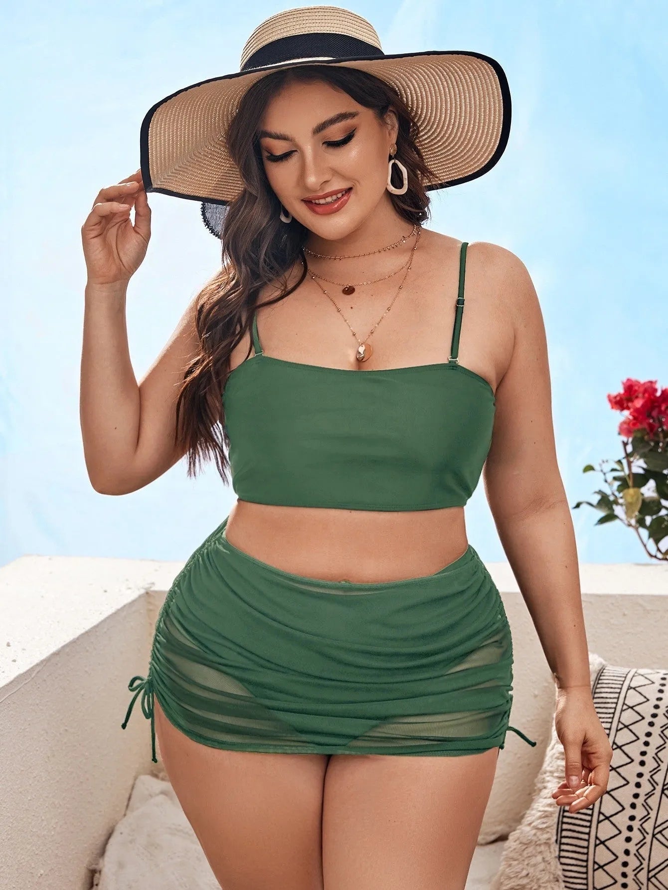 Women's solid colour mesh bikini three-piece set showing top, underwear and apron pieces
