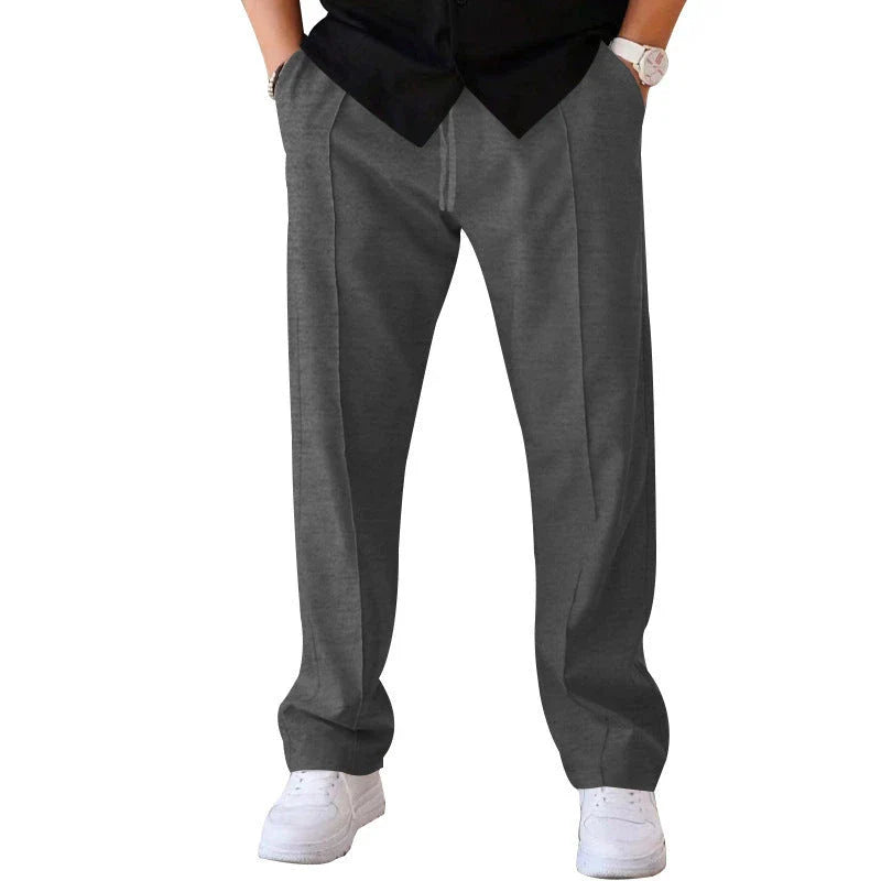 Relaxed fit drawstring waist sports pants for men in various colors and sizes