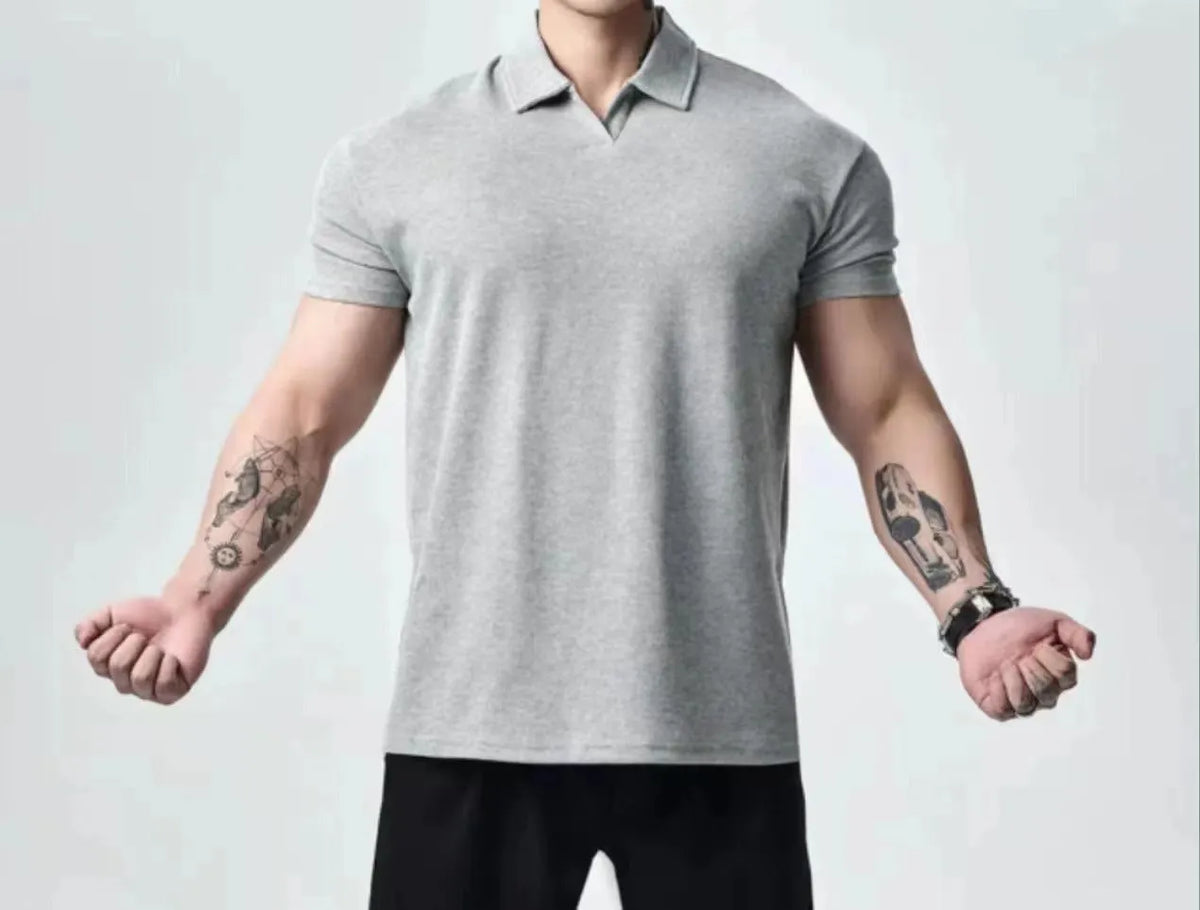 Men's loose fit retro T-shirt shown in black with a Henry collar on a mannequin.