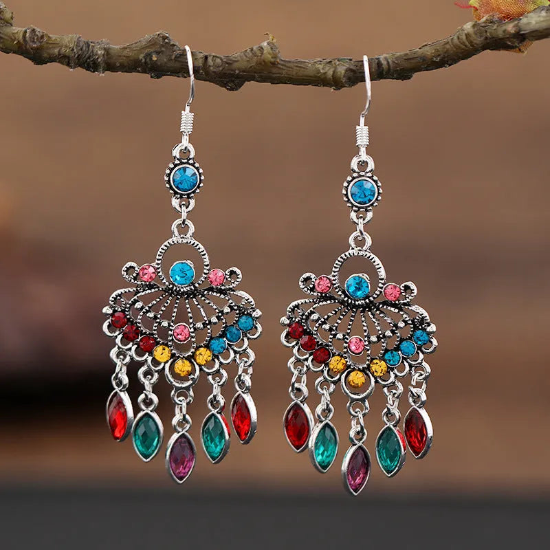 Purple long fringe drop earrings with crystals on a retro ethnic style alloy setting.