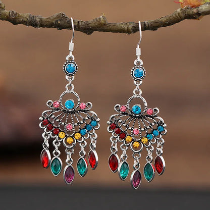 Purple long fringe drop earrings with crystals on a retro ethnic style alloy setting.