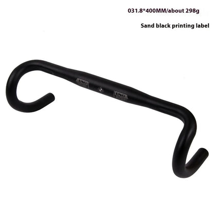 Black UNO road bike aluminium racing handlebar with small bent profile showing 31.8mm clamp markings