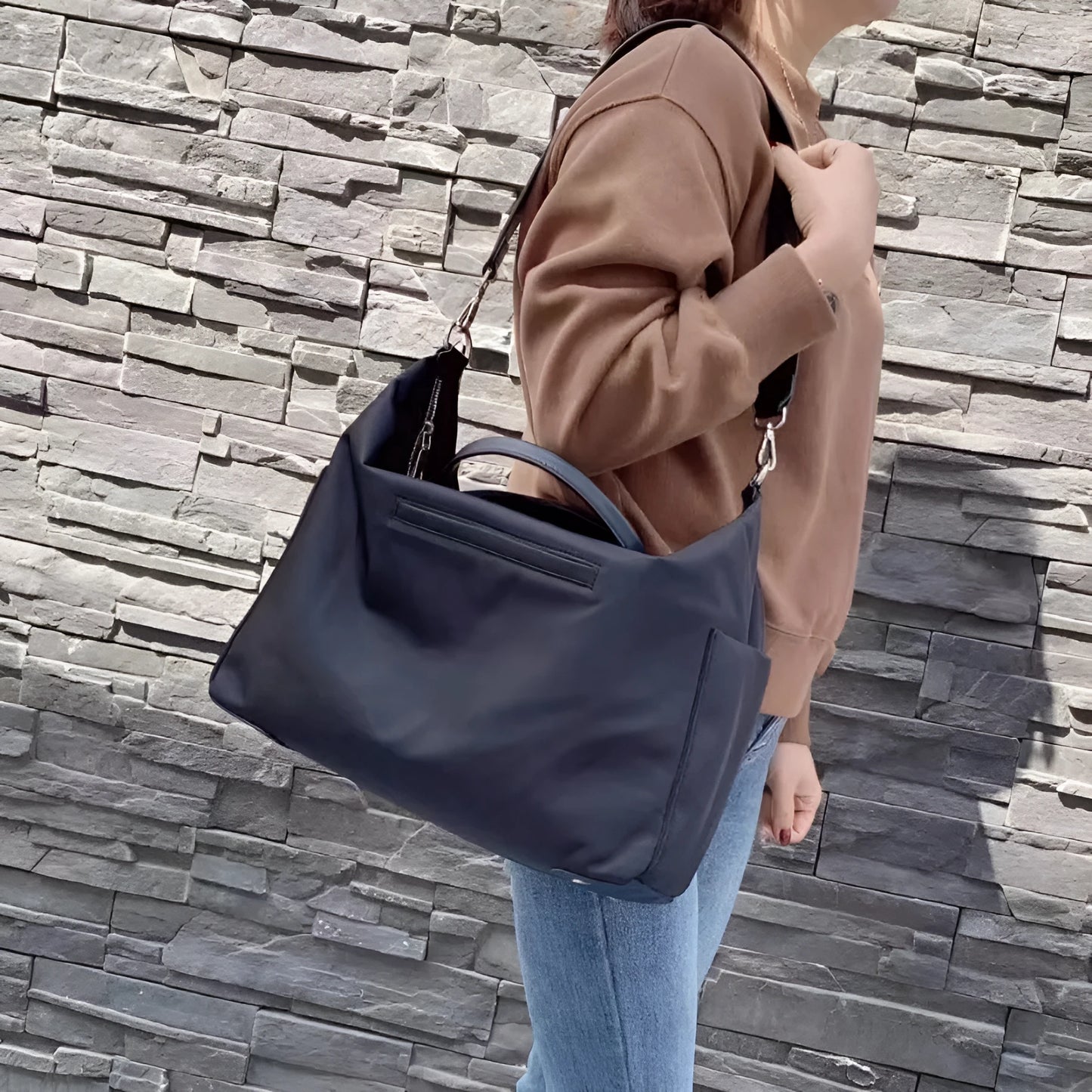 Nylon waterproof cloth shoulder bag with leather details in black or light khaki colour, 35x14x27cm dimensions