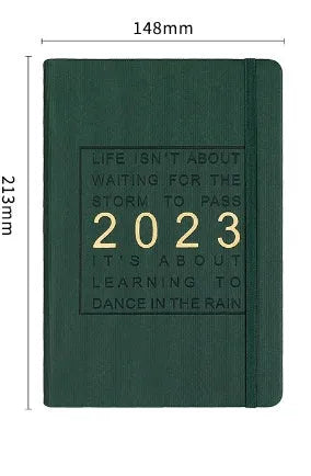 Creative student almanac diary with imitation leather cover open on a calendar page.