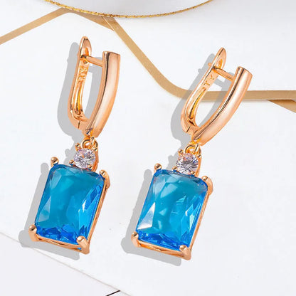 Square geometric copper earrings with electroplated gold or silver finish and quadrilateral design