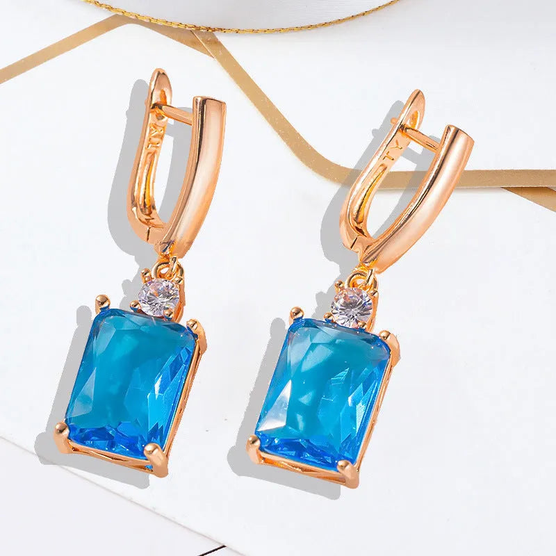Square geometry earrings made from copper with electroplated gold or silver finish, featuring quadrilateral popular elements for a bold geometric jewellery style