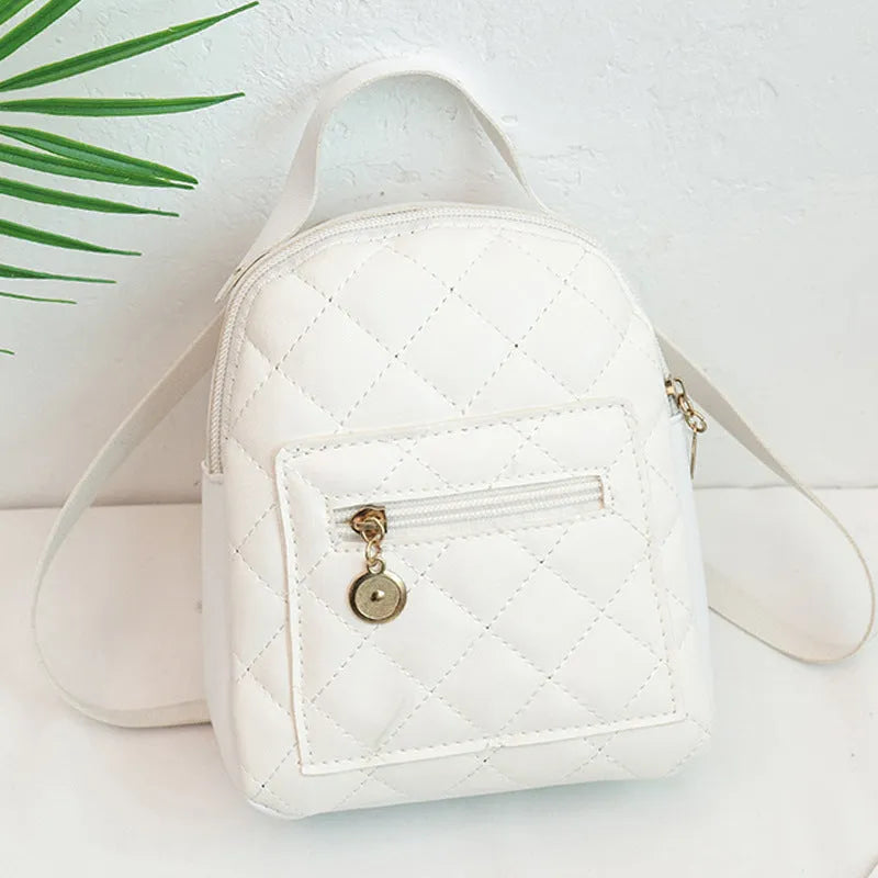Girls' Korean style embroidered backpack in solid colour with hard PU construction and sandwich pocket