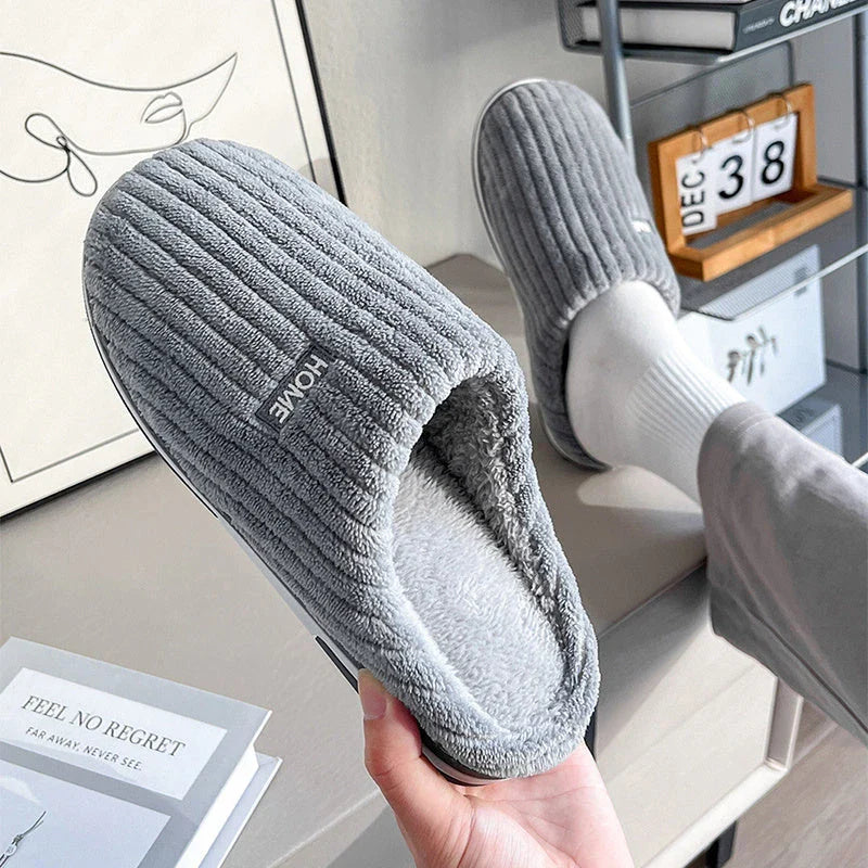 Cozy cotton slippers in various colors, featuring a soft, plush lining and non-slip rubber sole for indoor comfort and warmth