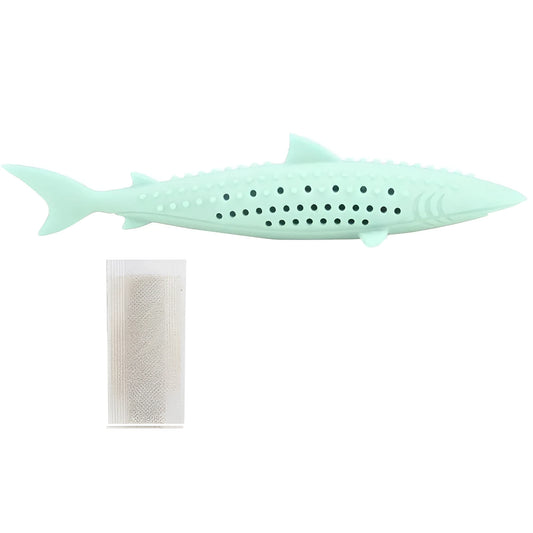 Green fish-shaped silicone cat chew toy with side holes, shown disassembled to reveal hollow interior for catnip.