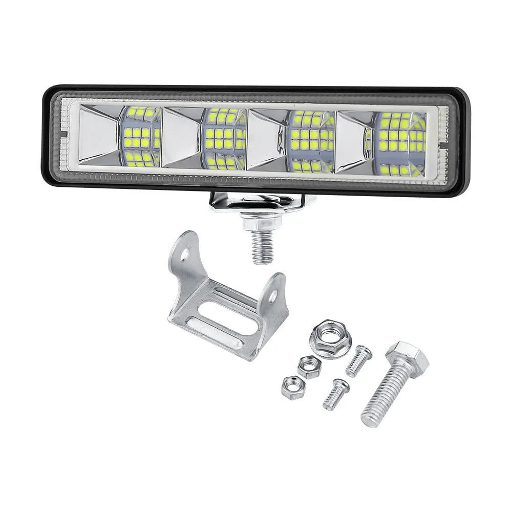 Pack of four rectangular aluminium LED work lights for car and truck modification.