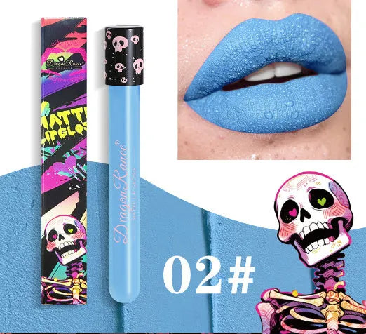 Halloween skull test tube lip gloss in gold and silver matte metallic shades showing doe-foot applicator.