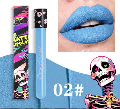 Halloween skull test tube lip gloss in gold and silver matte metallic shades showing doe-foot applicator.
