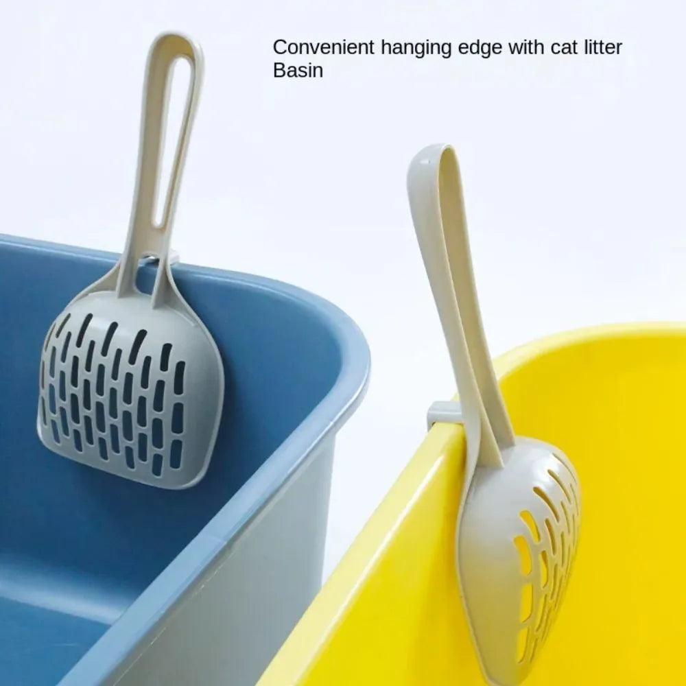 Grey plastic cat litter scoop with removable mesh screen and attached standing base.