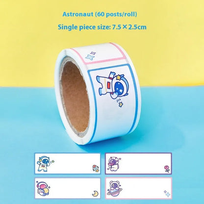 Roll of student name tape stickers with cartoon dinosaur, astronaut, rabbit, and girl designs for labelling