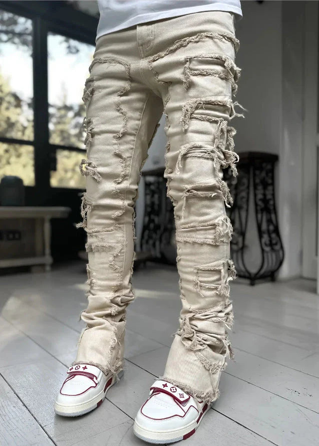 Stylish patched men's jeans with tight, stacked fit and variety of vibrant color options