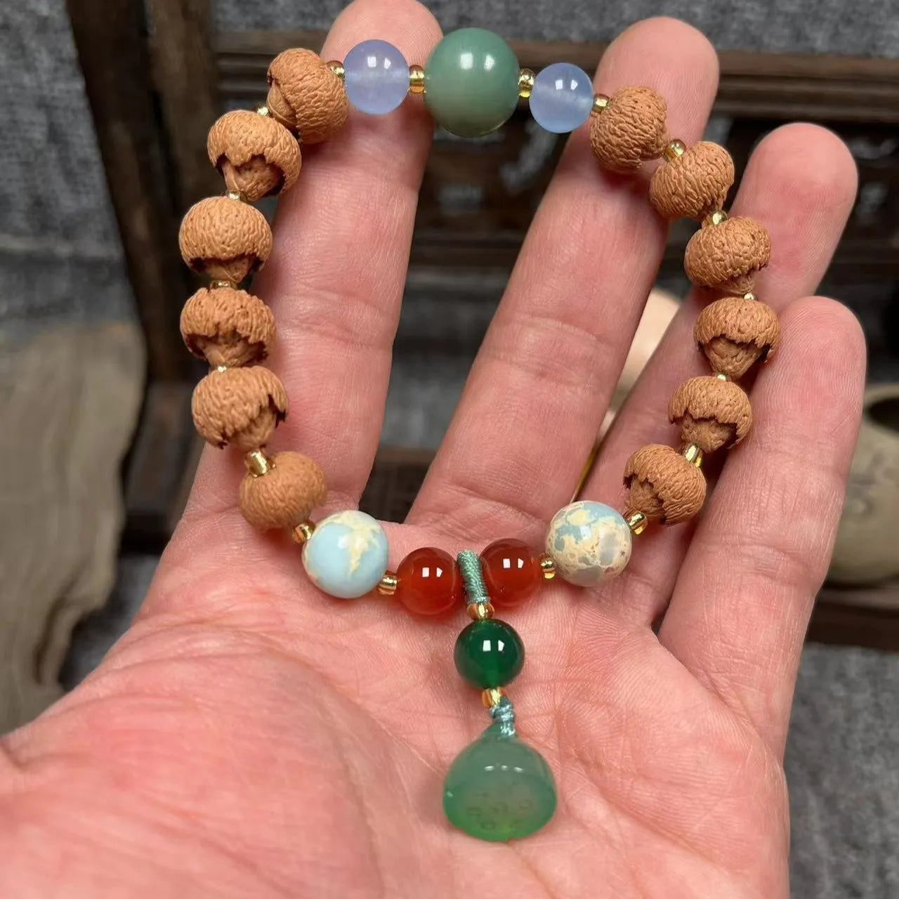 White Bodhi root bracelet with carved pumpkin lotus beads including Apple Orchard and Duobao styles