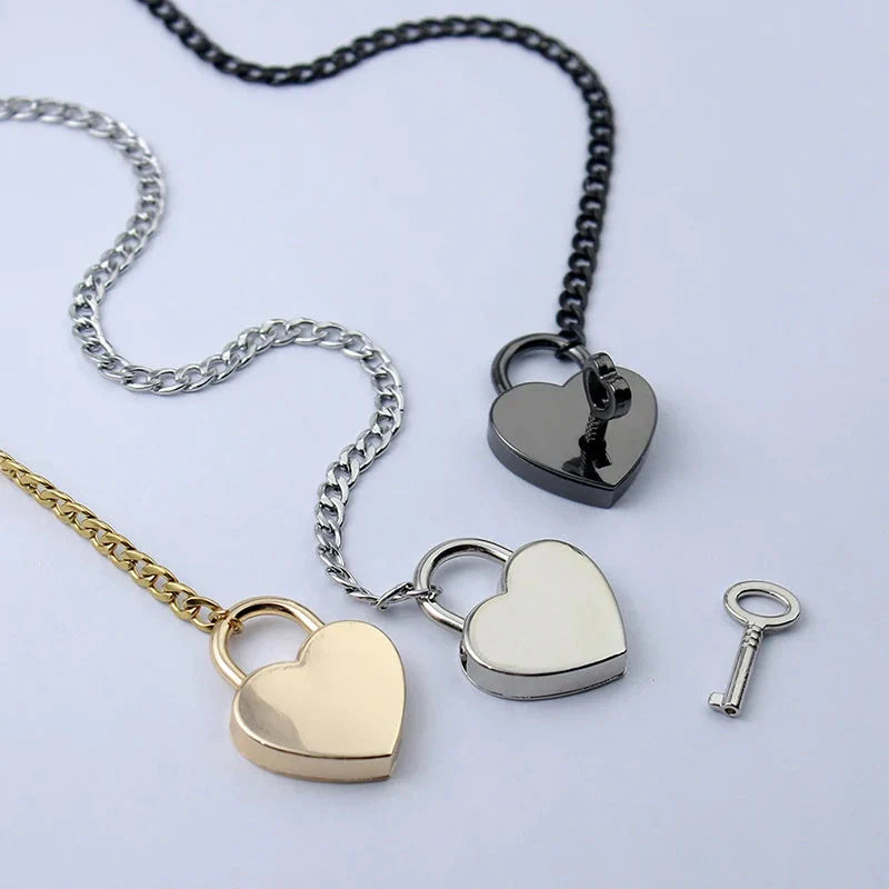 Adjustable heart-shaped O-ring slip chain necklace in black, silver, and gold