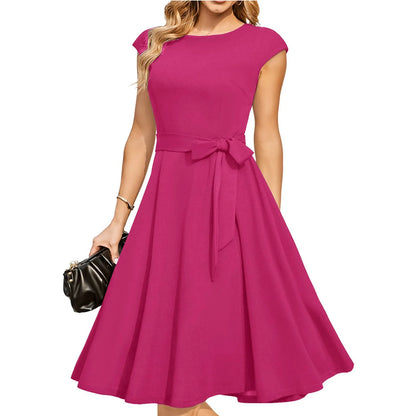 Sleeveless black dress with lace-up waist detail and a flowing swing skirt.