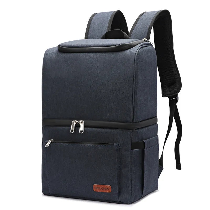 Blue insulated cooler backpack with shoulder straps and top handle