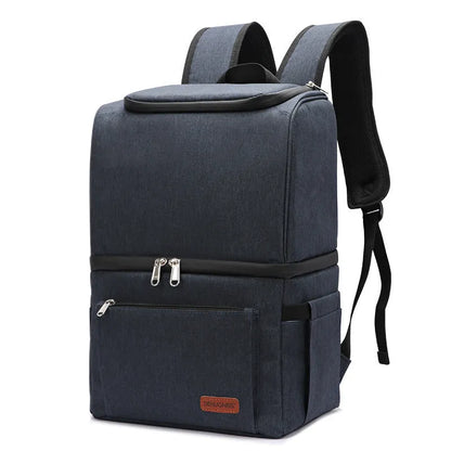 Blue insulated cooler backpack with shoulder straps and top handle