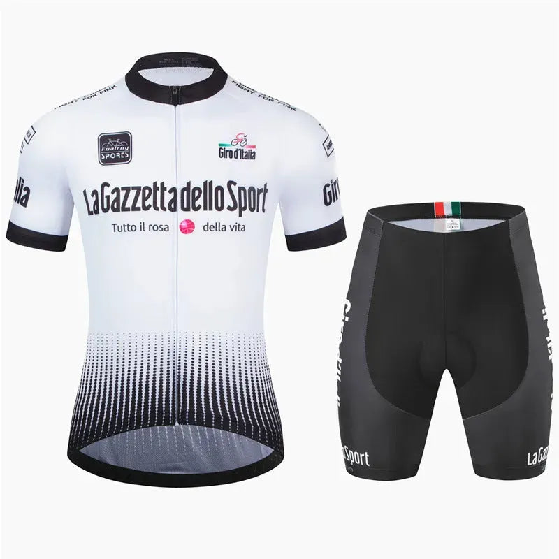 Loop short sleeve cycling suit in a patterned colour on a road bike, showing moisture-wicking fabric.