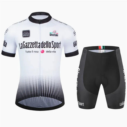 Loop short sleeve cycling suit in a patterned colour on a road bike, showing moisture-wicking fabric.