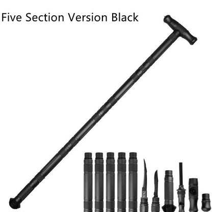 T-shaped telescoping hiking stick with compass, whistle, cutting edge, and glass breaker tip in black or gun grey finish