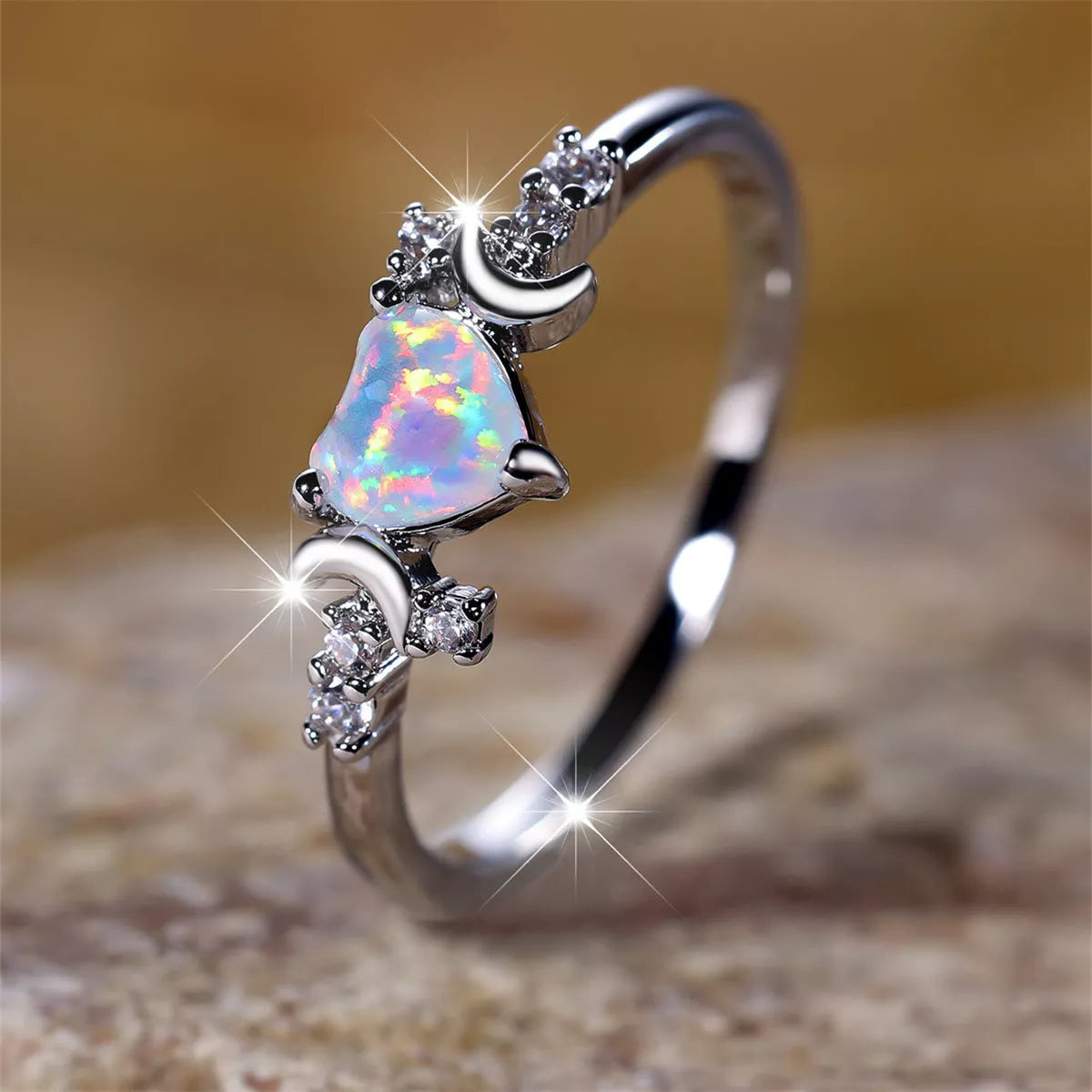 New Love Moon Three Claw Ring in platinum white opal and rose gold white opal