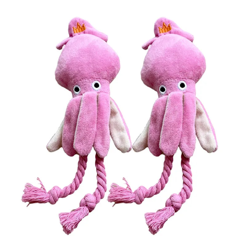 Pink squid-shaped corduroy plush dog toy with rope-like tentacles