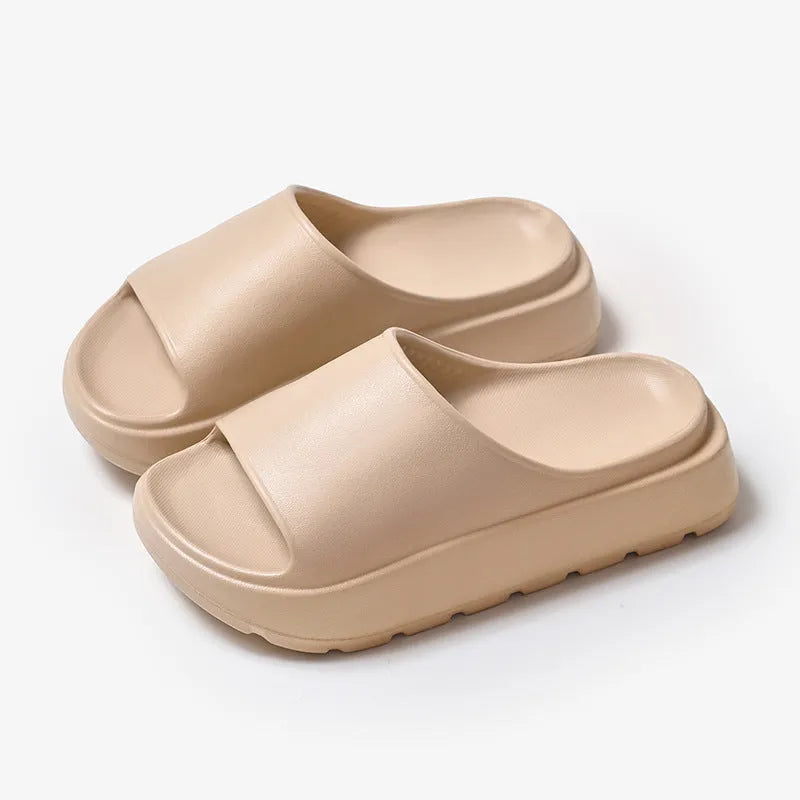 Women's beige 5.5cm thick-soled EVA slippers with injection-moulded construction for bathroom and beach use