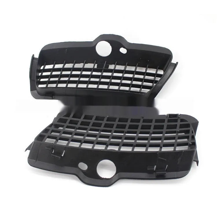 Pair of black ABS plastic Volkswagen Golf 3 fog lamp covers for front bumper.