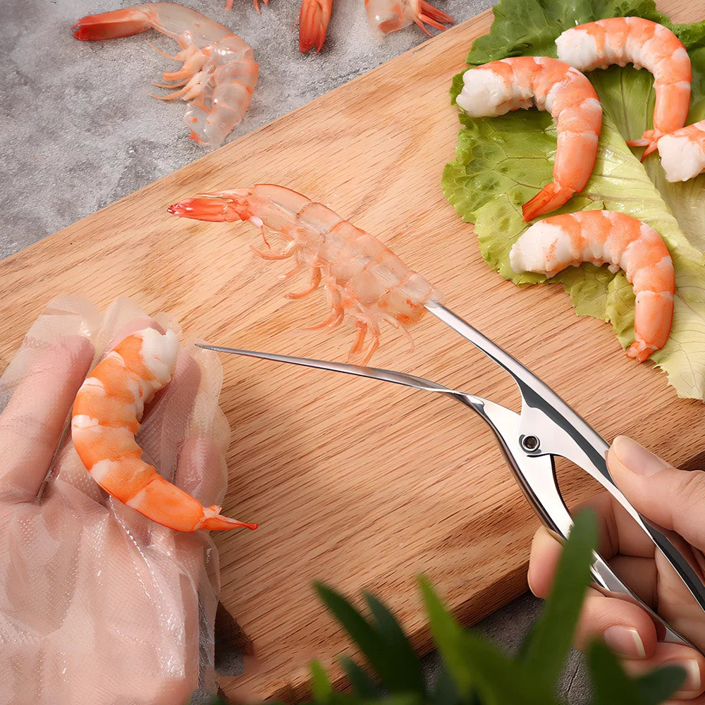Stainless steel shrimp peeler with 21cm length and ergonomic handle for shell removal