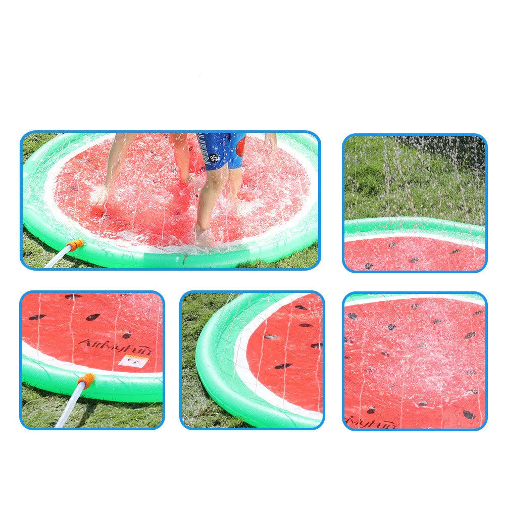 Children playing on a vibrant watermelon design water spray mat outdoors
