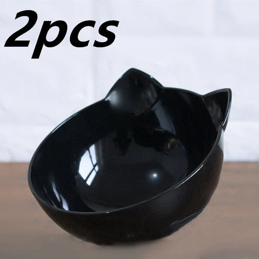 An inclined cat food bowl with a transparent design and a sturdy base, providing a comfortable and hygienic dining experience for your feline friend.