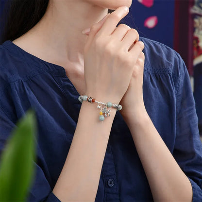 Natural jade and alloy vintage bracelet with retro style and pony bracelet design