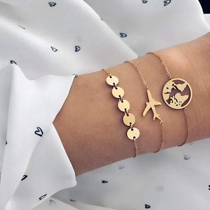 Set of three women's bohemian-style bracelets with heart charms showing an aircraft map design.