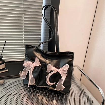 College style bow tote bag with large main compartment and internal zipper organiser in black colour