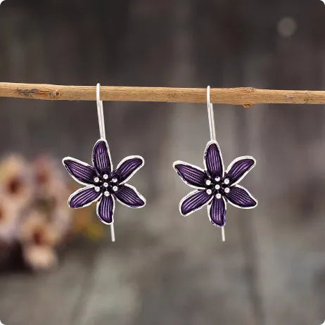 Purple flower-shaped alloy earrings with electroplated finish and post fastening