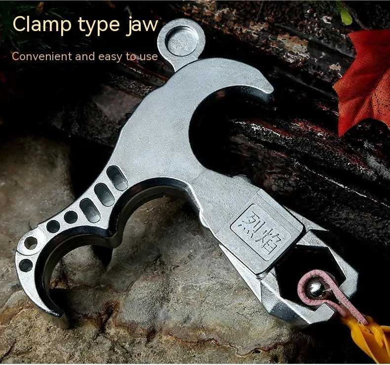 Alloy release aid with two-axis harpoon clip for archery and bowfishing, constructed from zinc alloy material for controlled arrow release and stainless steel components for corrosion resistance in demanding outdoor conditions.