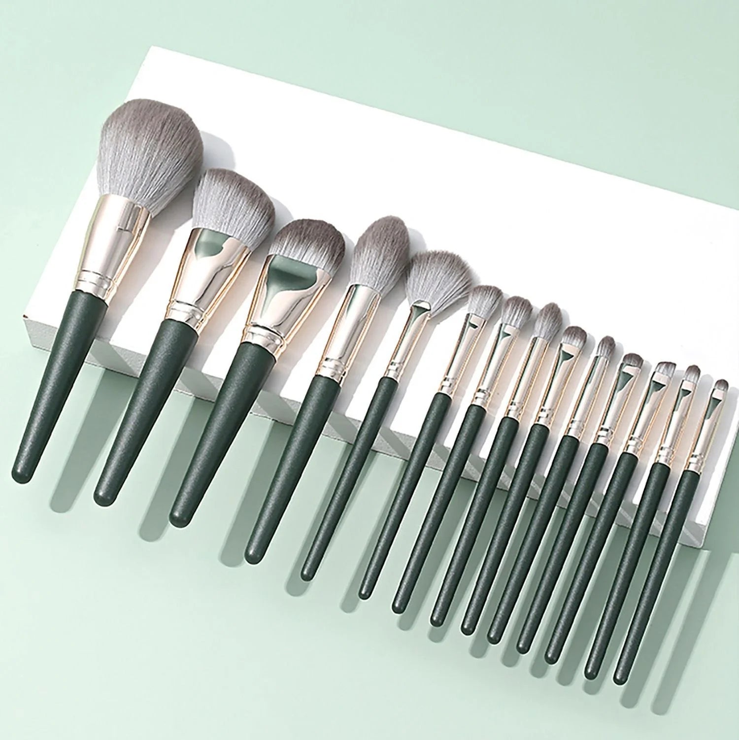 Green Cloud 14 Makeup Brushes Set with wooden handles and artificial fiber bristles
